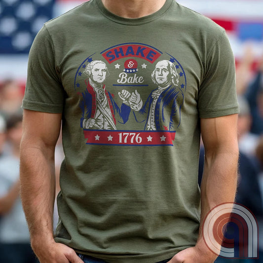 Shake & Bake 1776 t-shirt - George Washington and Thomas Jefferson pulling off a legendary Talladega Nights-style fist bump. Inspired by the Ricky Bobby & Cal Naughton Jr. duo, this design blends NASCAR culture with American Revolution history for a high-octane dose of freedom, fast cars, & Founding Fathers. For patriots, history buffs, & fans of red, white, & blue mischief, this tee is a must-have for those who live life in the fast lane and embrace American independence with a comedic twist. Color- Green