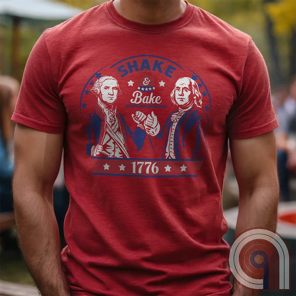 Shake & Bake 1776 t-shirt - George Washington and Thomas Jefferson pulling off a legendary Talladega Nights-style fist bump. Inspired by the Ricky Bobby & Cal Naughton Jr. duo, this design blends NASCAR culture with American Revolution history for a high-octane dose of freedom, fast cars, & Founding Fathers. For patriots, history buffs, & fans of red, white, & blue mischief, this tee is a must-have for those who live life in the fast lane and embrace American independence with a comedic twist. Color-Red