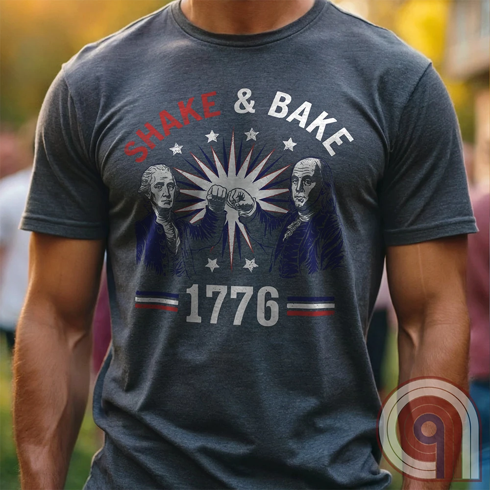 Revolution meets the racetrack with this Talladega Nights-inspired “Shake & Bake 1776” design, featuring George Washington and Benjamin Franklin throwing a victorious fist bump. A patriotic mashup of NASCAR culture and Founding Father grit, this tee celebrates American independence with speed, style, and historical swagger. Perfect for history buffs, liberty lovers, and anyone who believes in freedom, fast cars, and finishing first—because if you ain’t first, you’re last! Comedy Parody Tee. Color-Charc