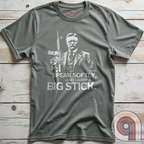 Striking Teddy Roosevelt 2A T-Shirt - legendary Rough Rider and American icon, with an AR-15 and his, 'Speak Softly, and Carry a Big Stick.' This design is a fearless blend of patriotism, rugged individuality, & Second Amendment rights. Perfect for gun lovers, history buffs, & freedom fighters who embrace bold American values. Pro-Second Amendment clothing that makes a statement—real leaders don’t ask permission to defend liberty. A tribute to freedom, strength, and the right to bear arms. Color- Grey2