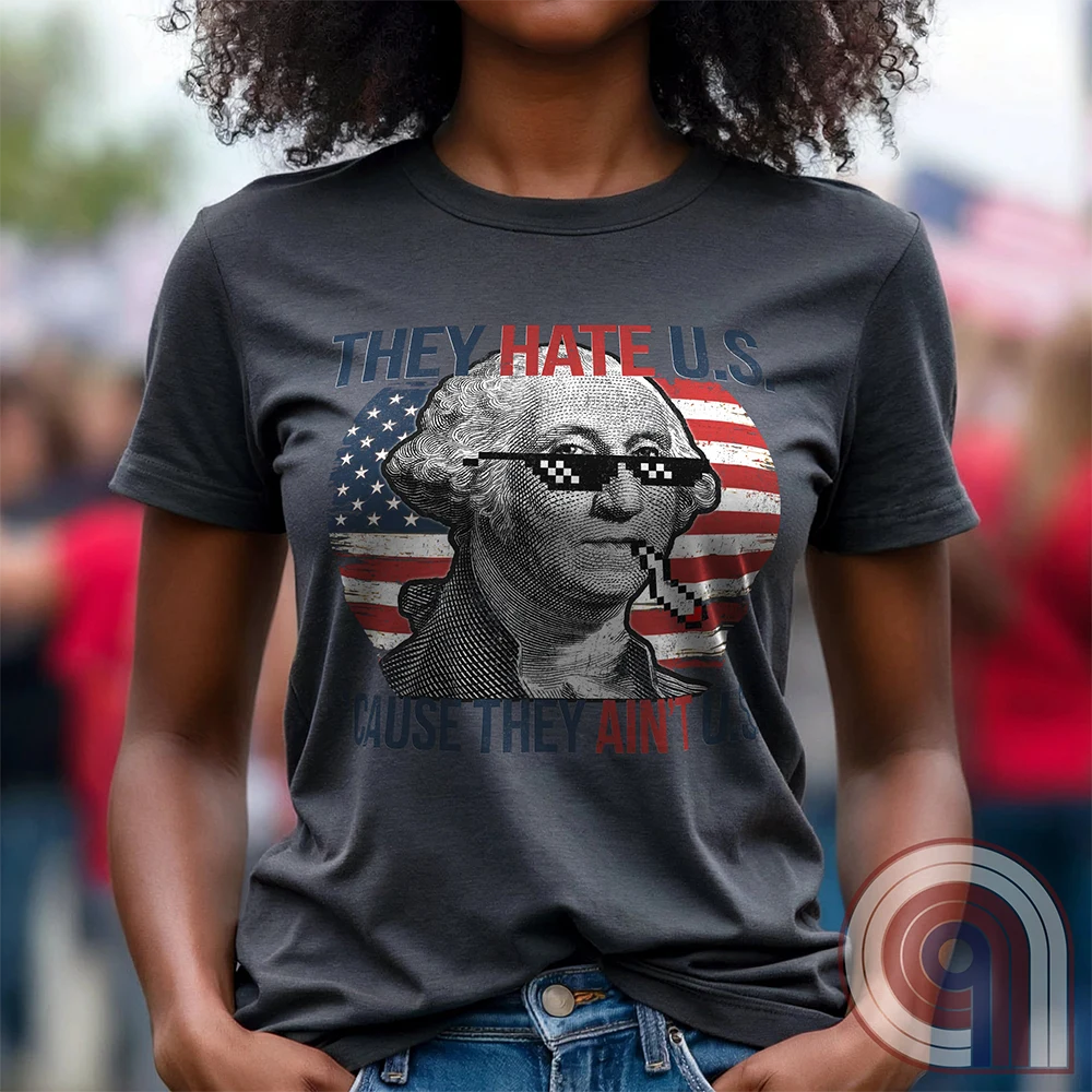 Boldly declare American independence with this They Hate U.S. 'Cause They Ain't U.S. t-shirt - A thug-life George Washington smoking in pixelated shades in front of a distressed American flag. A rebellious thug meme tee that mocks globalists, elitists, and jealous anti-American haters. Perfect for patriots, freedom lovers, & those who embrace the outlaw spirit of 1776. Show your unapologetic pride in American sovereignty, self-reliance, & the right to bear arms with this badass graphic. Color-Charc1
