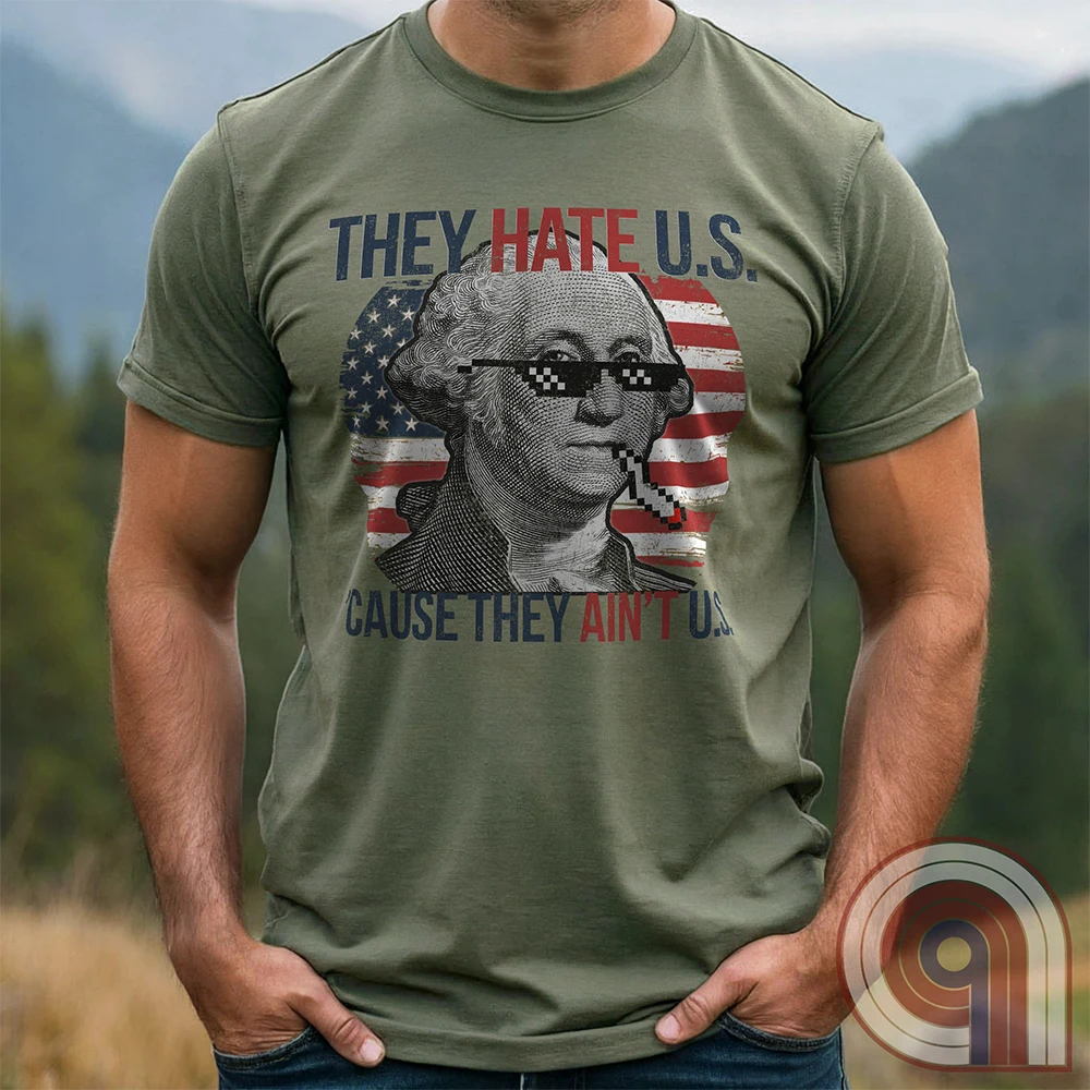 Boldly declare American independence with this They Hate U.S. 'Cause They Ain't U.S. t-shirt - A thug-life George Washington smoking in pixelated shades in front of a distressed American flag. A rebellious thug meme tee that mocks globalists, elitists, and jealous anti-American haters. Perfect for patriots, freedom lovers, & those who embrace the outlaw spirit of 1776. Show your unapologetic pride in American sovereignty, self-reliance, & the right to bear arms with this badass graphic. Color-Green1