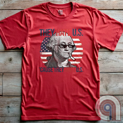 Boldly declare American independence with this They Hate U.S. 'Cause They Ain't U.S. t-shirt - A thug-life George Washington smoking in pixelated shades in front of a distressed American flag. A rebellious thug meme tee that mocks globalists, elitists, and jealous anti-American haters. Perfect for patriots, freedom lovers, & those who embrace the outlaw spirit of 1776. Show your unapologetic pride in American sovereignty, self-reliance, & the right to bear arms with this badass graphic. Color-Red2