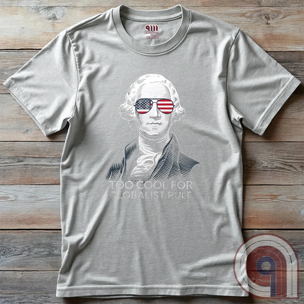 Some ideas refuse to die, no matter how many times history proves them wrong. But George Washington wasn’t having any of it, and neither are we. This Too Cool for Globalist Rule tee is a nod to American sovereignty, independence, and the fearless spirit that built this nation. While they keep pushing their tired, failed ideas under new names, patriots will always stand firm. Wear this shirt as a tribute to the Founding Fathers and a warning to those who seek control over free people. Color - Ash 2