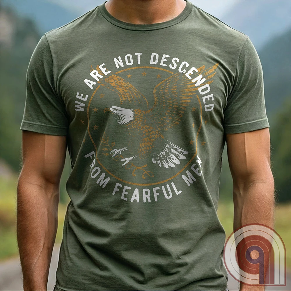 Defy fear and embrace American strength with this bold 'We Are Not Descended from Fearful Men' t-shirt. Featuring a fierce bald eagle, vintage stars, and distressed lettering, this design is a tribute to courage, resilience, & independence. Inspired by the unwavering spirit of the Founding Fathers, this patriotic tee is perfect for veterans, freedom fighters, & anyone who won’t back down. A statement piece for Americans who refuse to live in fear and believe liberty must be defended at all costs; Color:Grn2