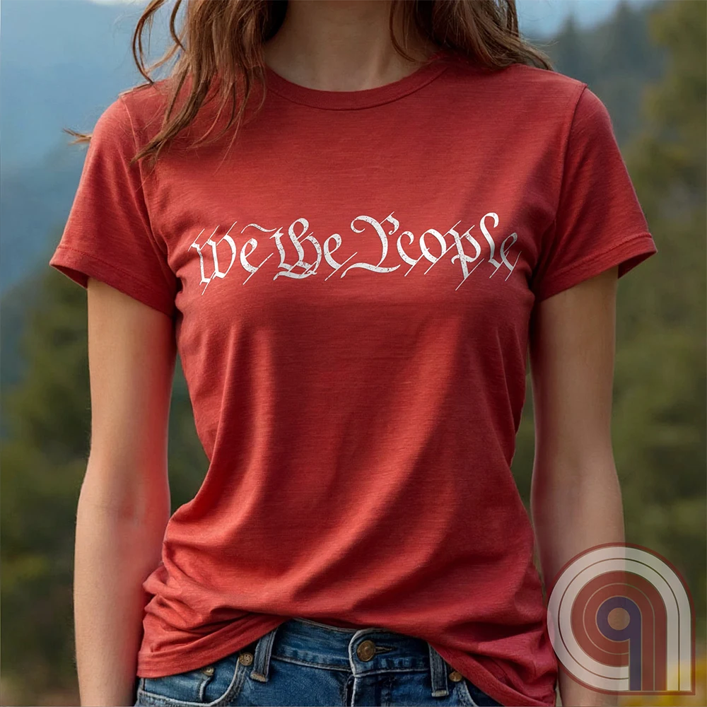 Show your patriotism with this bold 'We The People' t-shirt, inspired by the U.S. Constitution. Featuring classic calligraphy from the founding document, this design represents American freedom, liberty, & the power of the people. Perfect for proud patriots, constitutionalists, & those who stand for individual rights. Celebrate the Bill of Rights, defend the Second Amendment, & stand for limited government with this statement of American values, independence, self-governance, & personal liberty. Color- Red2