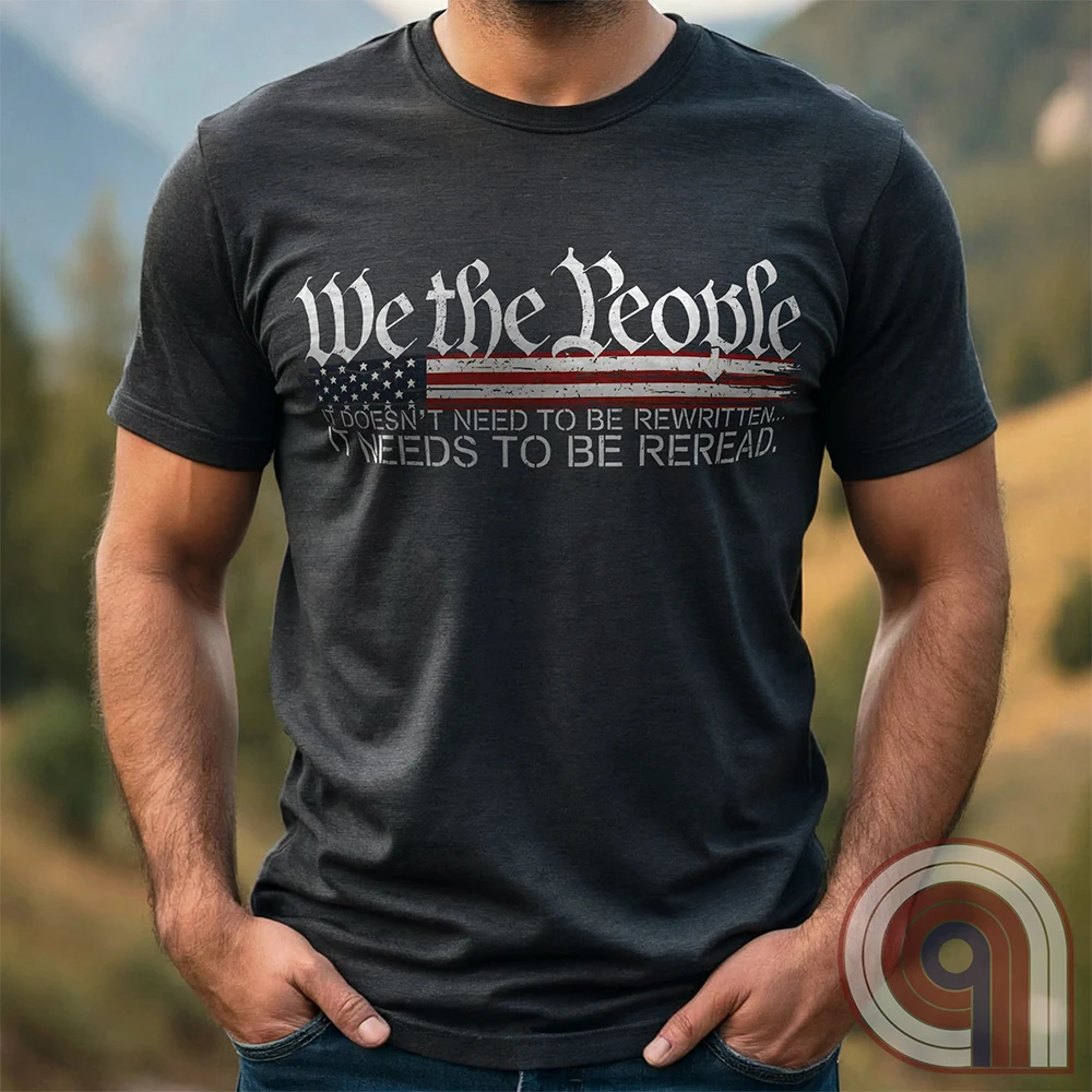 Show your patriotism with this bold 'We The People' t-shirt, featuring the iconic preamble of the U.S. Constitution. With a distressed American flag backdrop, this design is a statement for those who believe in defending the Constitution, freedom, & liberty. Ideal for patriots, conservatives, and constitutionalists who value the Bill of Rights & American history. A must-have for those who oppose government overreach, censorship, and revisionist history. Wear it proudly as a tribute to America. Color: Charc2