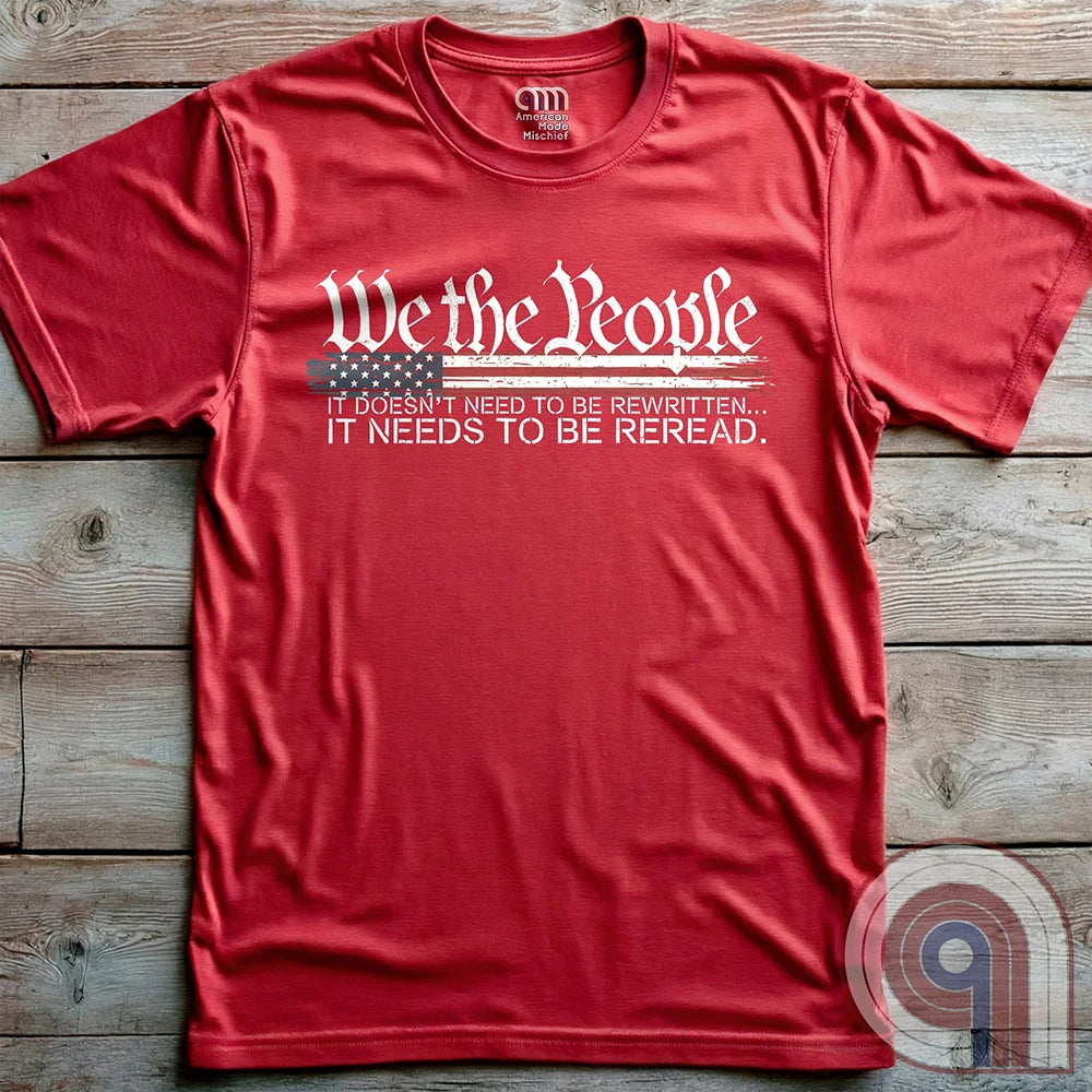 Show your patriotism with this bold 'We The People' t-shirt, featuring the iconic preamble of the U.S. Constitution. With a distressed American flag backdrop, this design is a statement for those who believe in defending the Constitution, freedom, & liberty. Ideal for patriots, conservatives, and constitutionalists who value the Bill of Rights & American history. A must-have for those who oppose government overreach, censorship, and revisionist history. Wear it proudly as a tribute to America. Color: Red