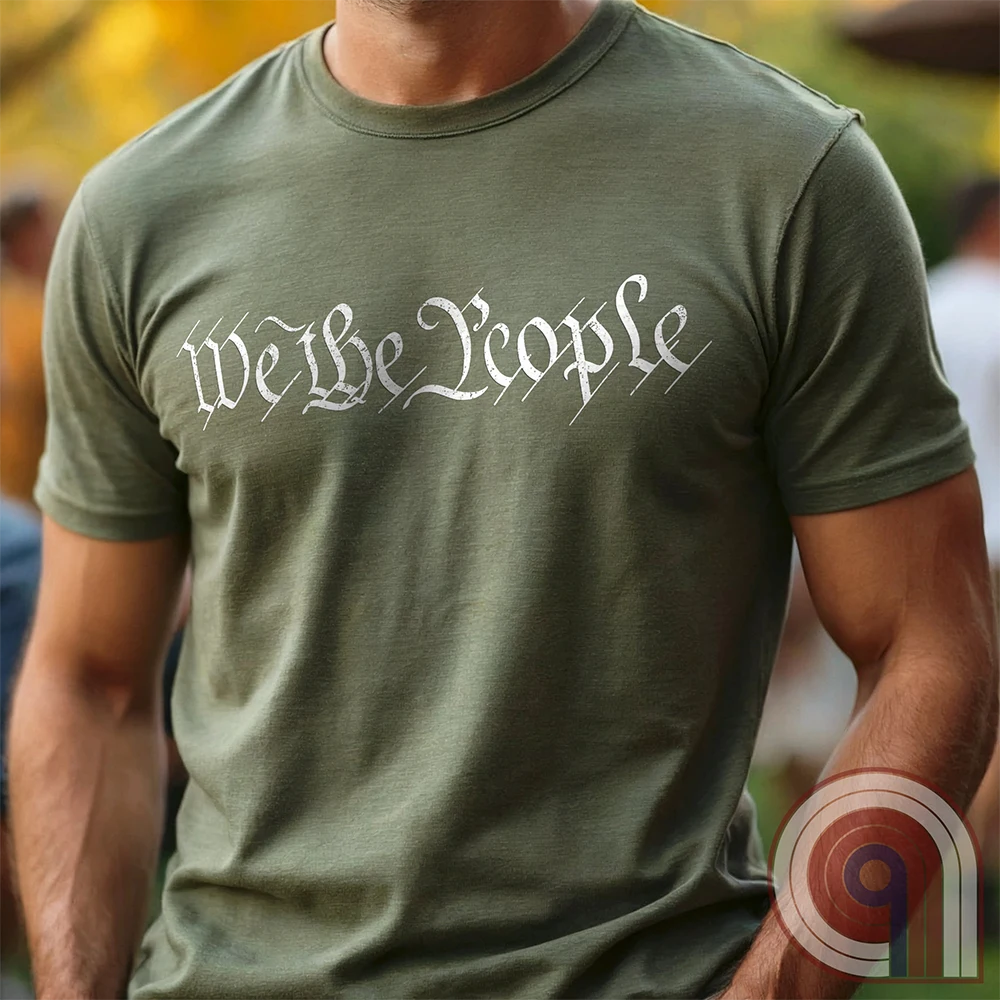 Show your patriotism with this bold 'We The People' t-shirt, inspired by the U.S. Constitution. Featuring classic calligraphy from the founding document, this design represents American freedom, liberty, & the power of the people. Perfect for proud patriots, constitutionalists, & those who stand for individual rights. Celebrate the Bill of Rights, defend the Second Amendment, & stand for limited government with this statement of American values, independence, self-governance, & personal liberty.Color-Green2