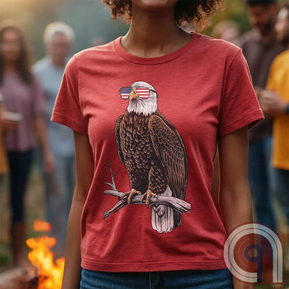 Declare your independence with this striking Pro USA t-shirt featuring America’s ultimate symbol of freedom—the bald eagle—sporting American flag sunglasses. It’s not just a patriotic tee—it’s a statement of strength, sovereignty, and pride. 
Bald eagle t-shirt;Patriotic eagle shirt;American flag sunglasses design;USA freedom shirt;Pro-America graphic tee;Unisex patriotic t-shirt;Eagle with American flag glasses shirt;Conservative values;July 4th eagle t-shirt;USA-made freedom apparel;MAGA;1776; - Red
