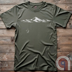 Minimalist inspirational t-shirt graphic showing a lone penguin walking away beneath a vast snow-covered mountain range, inspired by Werner Herzog’s wandering penguin documentary scene. This Tee evokes existential solitude, Faustian spirit, nihilism, faith, and quiet bravery, symbolizing the call to adventure, isolation, perseverance, philosophy, and the human search for meaning through nature, exploration, and understated surreal meme culture. Green