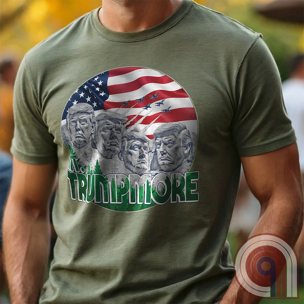 Mount Trumpmore stands as a bold symbol of American resilience, patriotism, and leadership. This striking t-shirt reimagines a national monument in the image of Donald Trump, embodying strength, defiance, & commitment to America first. Set against the stars & stripes, this shirt captures the grandeur of a historical moment & the glory of a triumphant return. For patriots who refuse to let America fade, this tee celebrates leadership and a vision of American greatness carved into history. Color- Green1