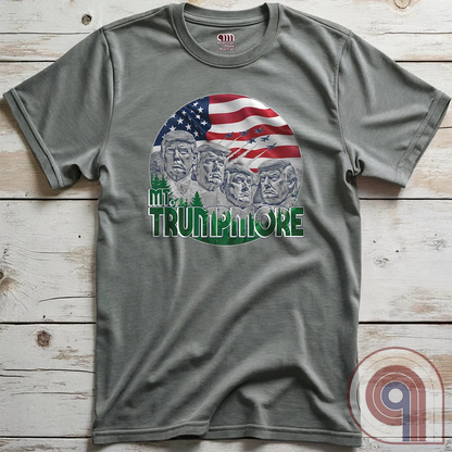 Mount Trumpmore stands as a bold symbol of American resilience, patriotism, and leadership. This striking t-shirt reimagines a national monument in the image of Donald Trump, embodying strength, defiance, & commitment to America first. Set against the stars & stripes, this shirt captures the grandeur of a historical moment & the glory of a triumphant return. For patriots who refuse to let America fade, this tee celebrates leadership and a vision of American greatness carved into history. Color- Grey2