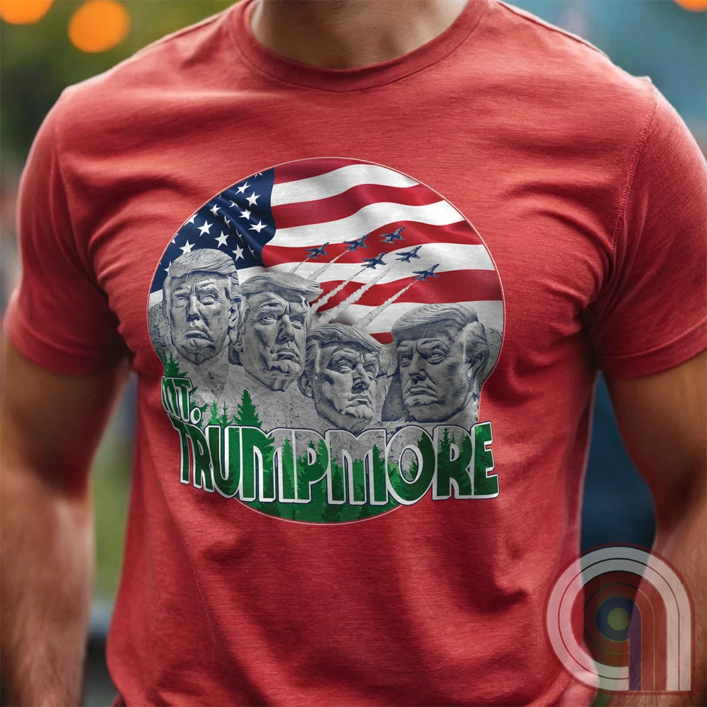 Mount Trumpmore stands as a bold symbol of American resilience, patriotism, and leadership. This striking t-shirt reimagines a national monument in the image of Donald Trump, embodying strength, defiance, & commitment to America first. Set against the stars & stripes, this shirt captures the grandeur of a historical moment & the glory of a triumphant return. For patriots who refuse to let America fade, this tee celebrates leadership and a vision of American greatness carved into history. Color- Red1