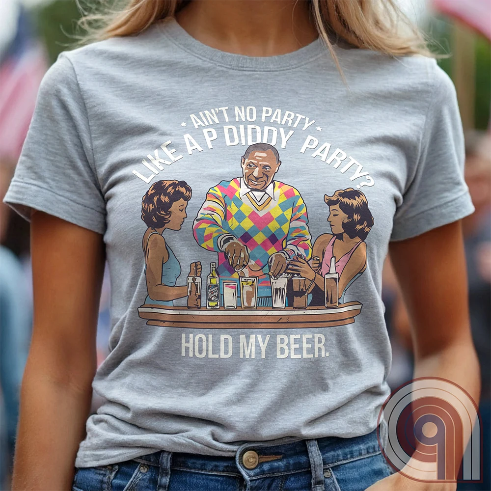 Bill Cosby, Hollywood’s original master mixologist, lines up the drinks with a devilish grin, proving he’s not about to be outdone by P Diddy in the elite predator party scene. This retro-style tee satirizes the scandal showdown, where the rich and powerful mix more than just cocktails. With a vintage-inspired no-nonsense design, this shirt calls out the dark underbelly of Hollywood hypocrisy. Perfect for those who expose the truth, mock the elite, and refuse to let history be rewritten. Color- Ash1