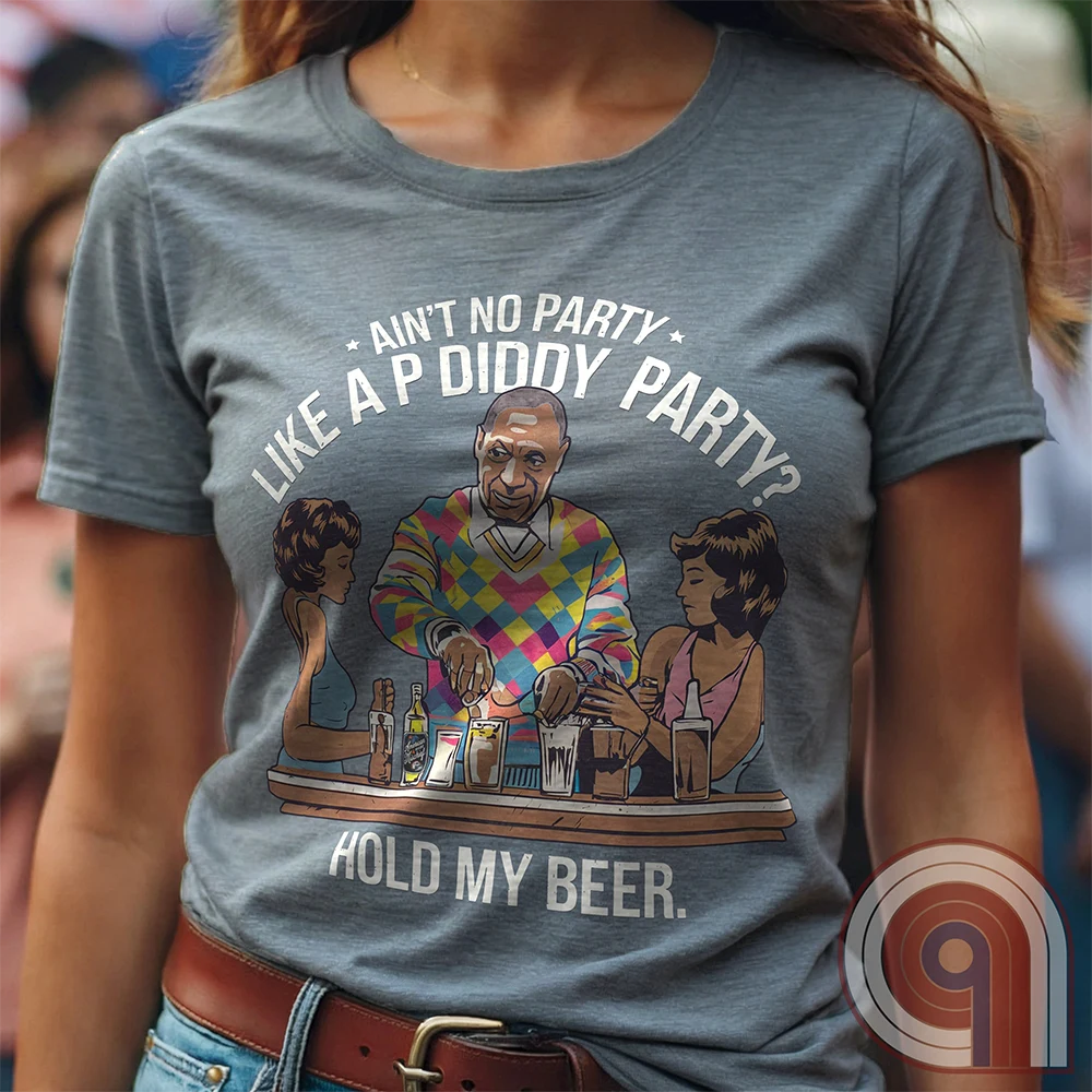 Bill Cosby, Hollywood’s original master mixologist, lines up the drinks with a devilish grin, proving he’s not about to be outdone by P Diddy in the elite predator party scene. This retro-style tee satirizes the scandal showdown, where the rich and powerful mix more than just cocktails. With a vintage-inspired no-nonsense design, this shirt calls out the dark underbelly of Hollywood hypocrisy. Perfect for those who expose the truth, mock the elite, and refuse to let history be rewritten. Color- Grey1