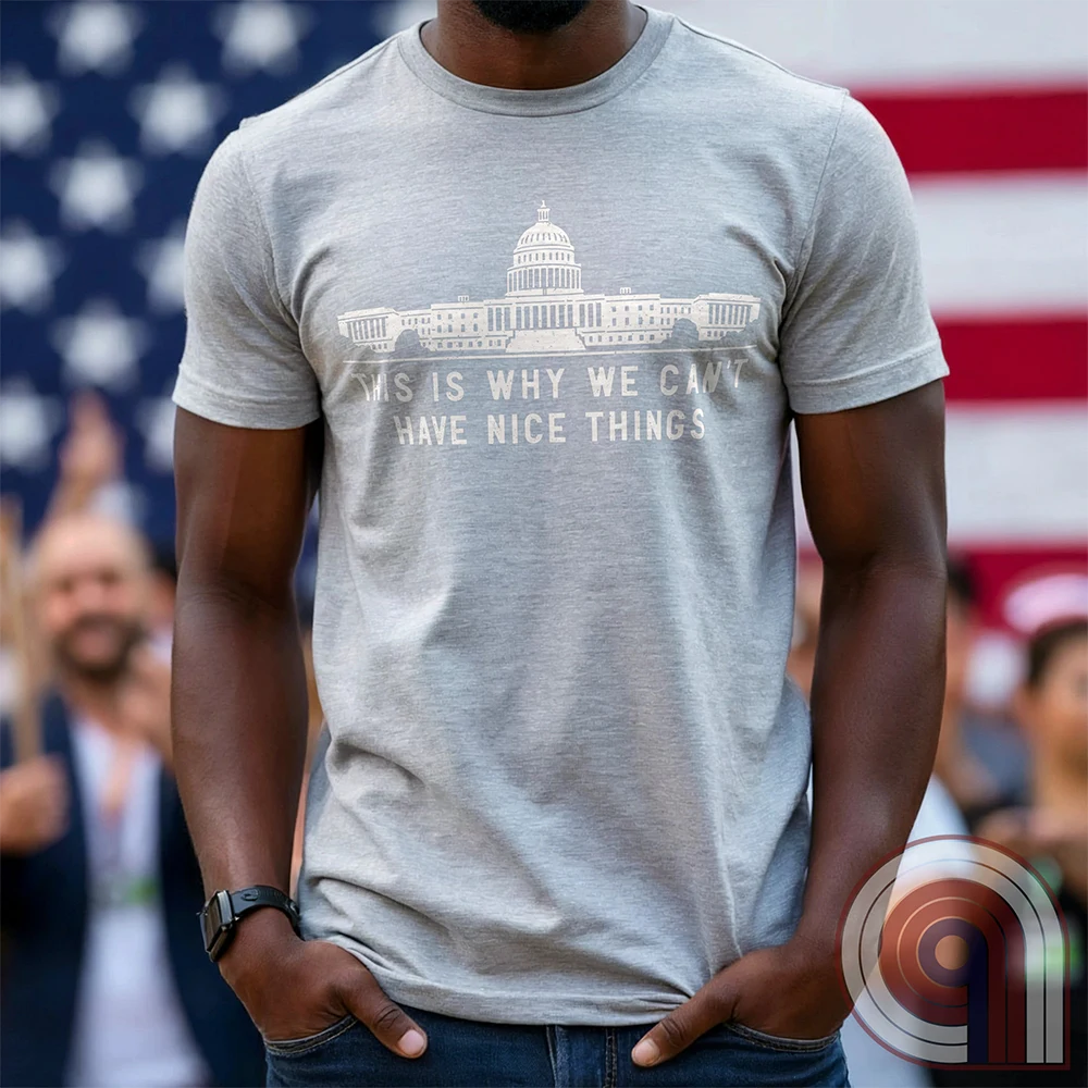 "This Is Why We Can't Have Nice Things" political satire t-shirt exposing congressional corruption, government waste, & the reckless mismanagement of American resources. Featuring bold typography and a minimalist design, this anti-establishment tee makes a statement against fraud, bureaucratic incompetence, & the squandering of taxpayer dollars. A must-have for those who demand accountability & transparency from elected officials. Wear it loud and proud to call out the system’s failures. Color- Ash1