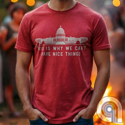 "This Is Why We Can't Have Nice Things" political satire t-shirt exposing congressional corruption, government waste, & the reckless mismanagement of American resources. Featuring bold typography and a minimalist design, this anti-establishment tee makes a statement against fraud, bureaucratic incompetence, & the squandering of taxpayer dollars. A must-have for those who demand accountability & transparency from elected officials. Wear it loud and proud to call out the system’s failures. Color- Red1