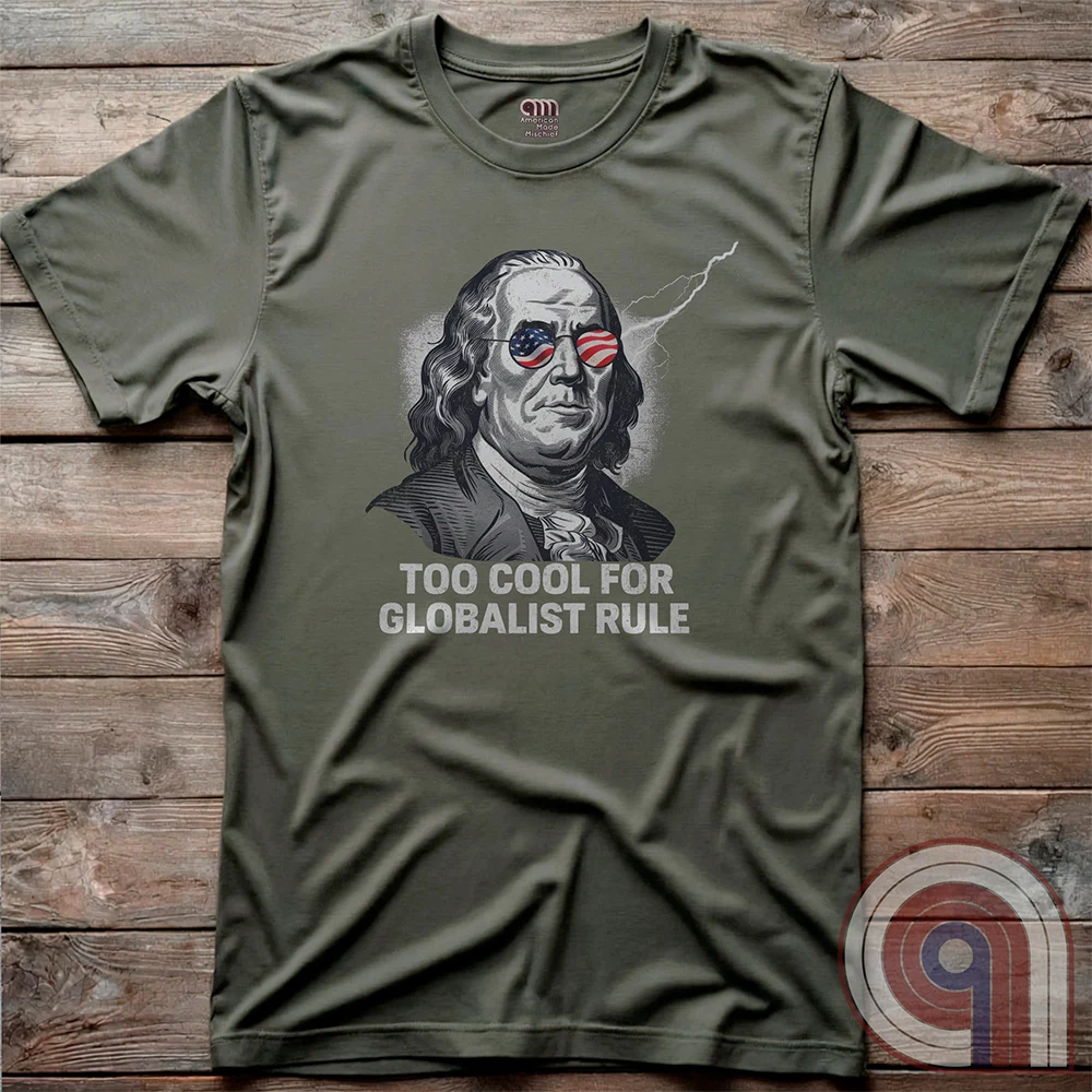 Bold and electrifying, this Too Cool for Globalist Rule t-shirt features Ben Franklin rocking patriotic American flag sunglasses, radiating defiance against tyranny. With a lightning bolt in the backdrop, this anti-globalist, pro-sovereignty design embodies the rebellious spirit of American independence. Inspired by Franklin’s quote “Rebellion to tyrants is obedience to God”, this patriotic tee is a warning to globalist elites, communists, and tyrants—freedom-loving Americans won’t kneel. Color- Green2