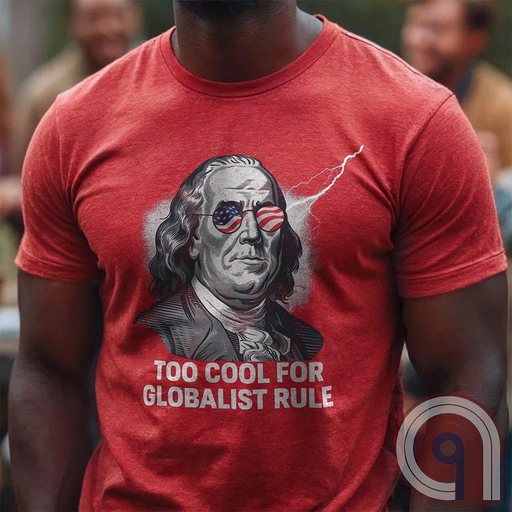 Bold and electrifying, this Too Cool for Globalist Rule t-shirt features Ben Franklin rocking patriotic American flag sunglasses, radiating defiance against tyranny. With a lightning bolt in the backdrop, this anti-globalist, pro-sovereignty design embodies the rebellious spirit of American independence. Inspired by Franklin’s quote “Rebellion to tyrants is obedience to God”, this patriotic tee is a warning to globalist elites, communists, and tyrants—freedom-loving Americans won’t kneel. Color- Red1