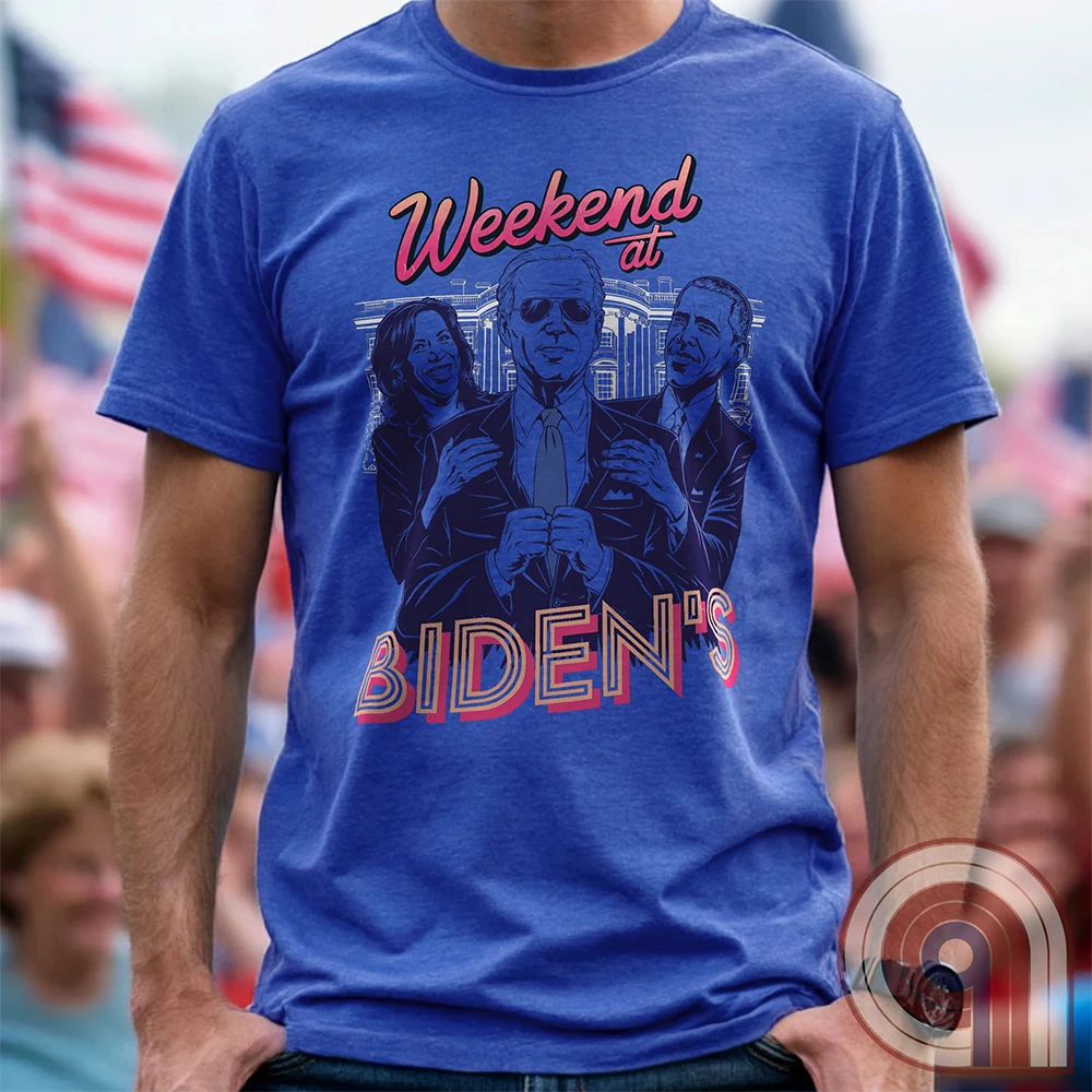 A hilarious political satire t-shirt featuring "Weekend at Biden’s," a parody of the classic comedy, reimagined with Joe Biden as the lifeless puppet propped up by Kamala Harris & Barack Obama. With a retro 80s aesthetic, this anti-establishment tee calls out the illusion of leadership & the deep-state handlers pulling the strings. A must-have for conservatives, libertarians, & free-thinkers who see through the charade. Perfect for rallies, protests, or just triggering clueless liberals! Color - Blue1